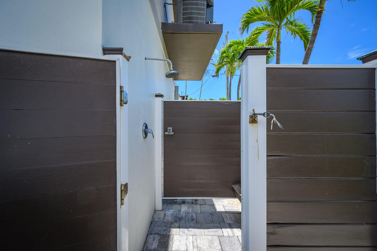 14 East Ocean Drive Marathon, FL 33050 - Photo 33 of 48 a potted plant in front of a door