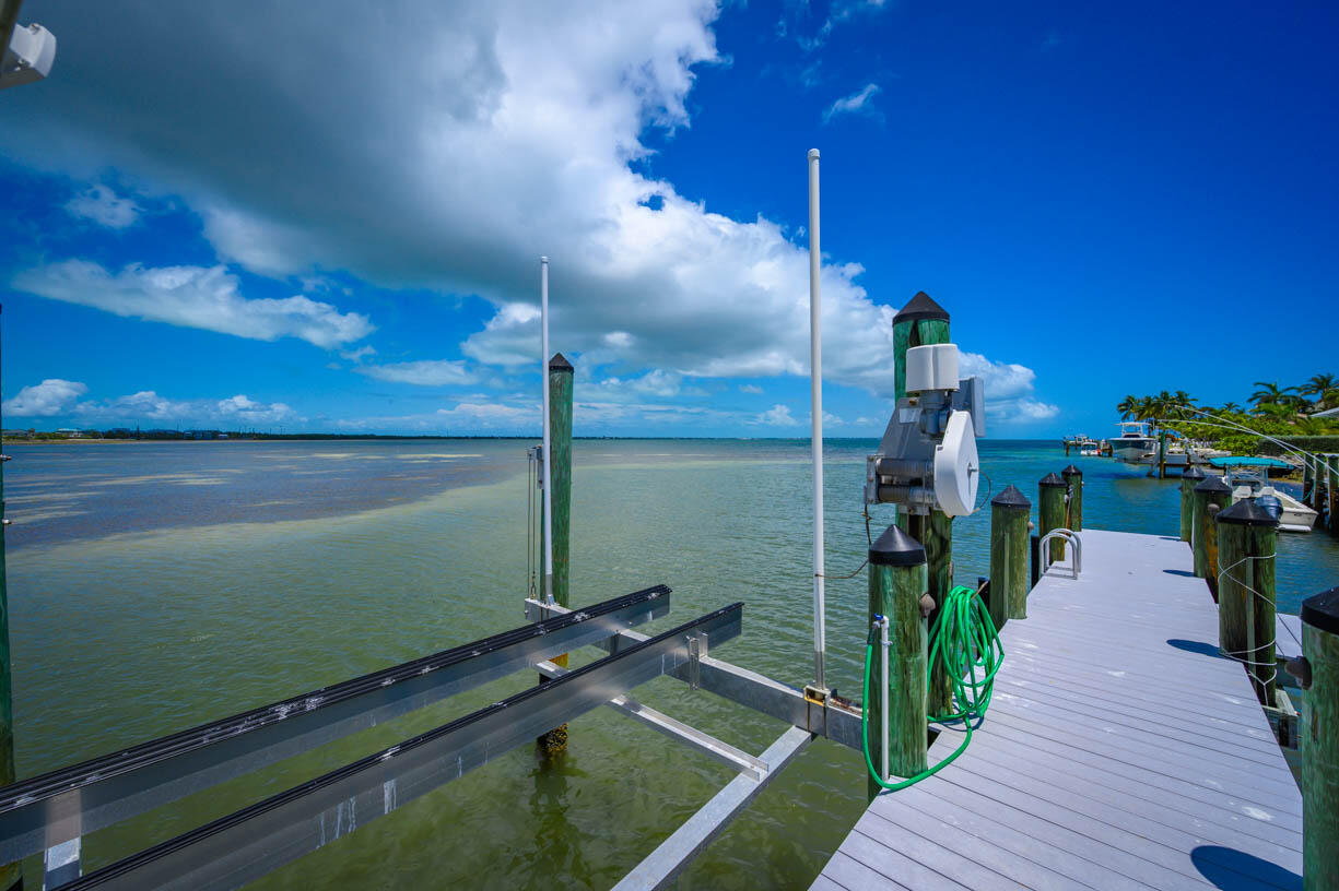 14 East Ocean Drive Marathon, FL 33050 - Photo 36 of 48 a view of a balcony with potted plants