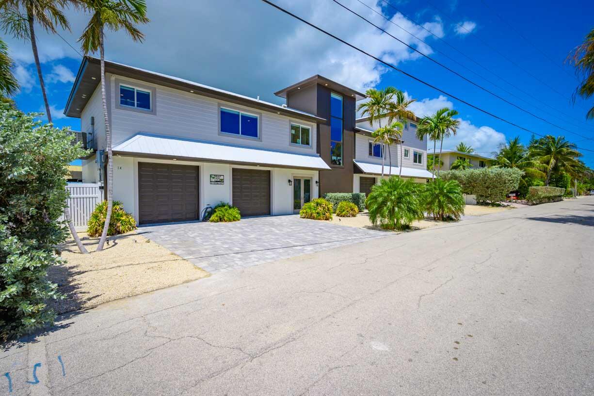 14 East Ocean Drive Marathon, FL 33050 - Photo 38 of 48 a view of a building with a yard