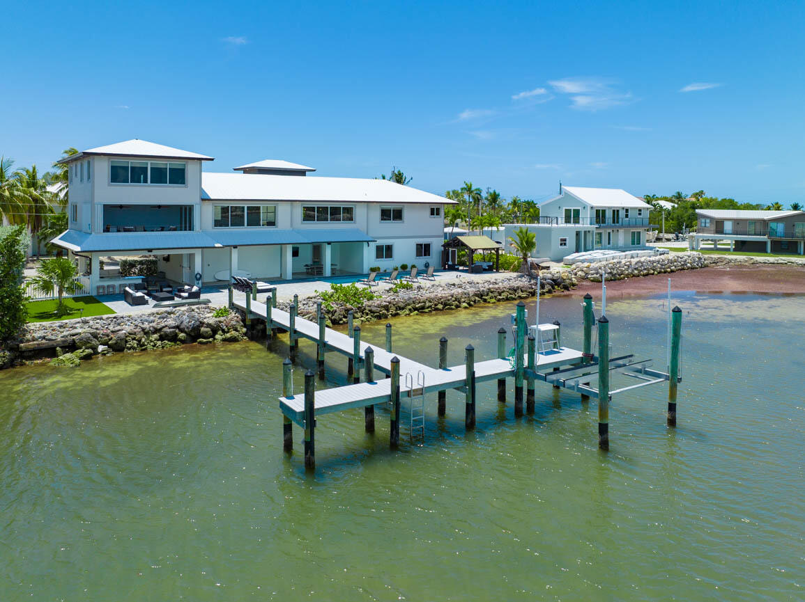 14 East Ocean Drive Marathon, FL 33050 - Photo 40 of 48 a roof deck with table and chairs