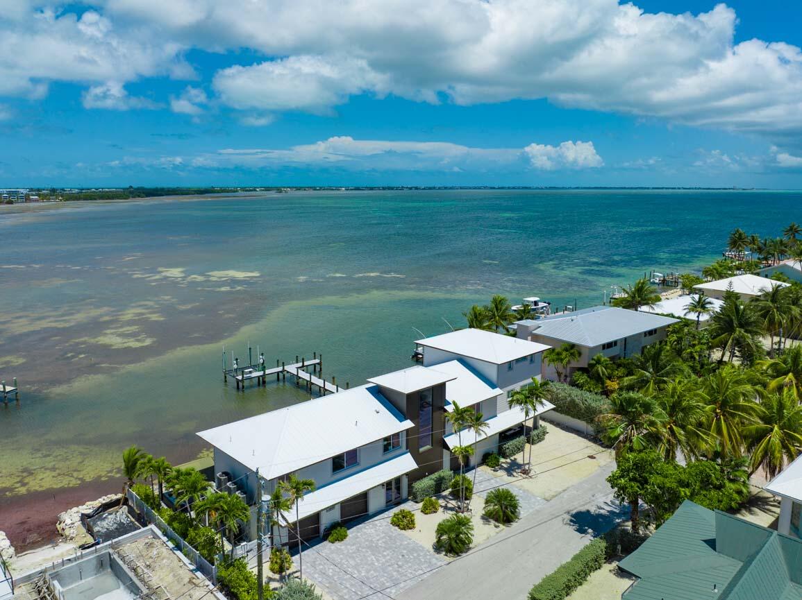 14 East Ocean Drive Marathon, FL 33050 - Photo 44 of 48 a view of a terrace with lawn chairs
