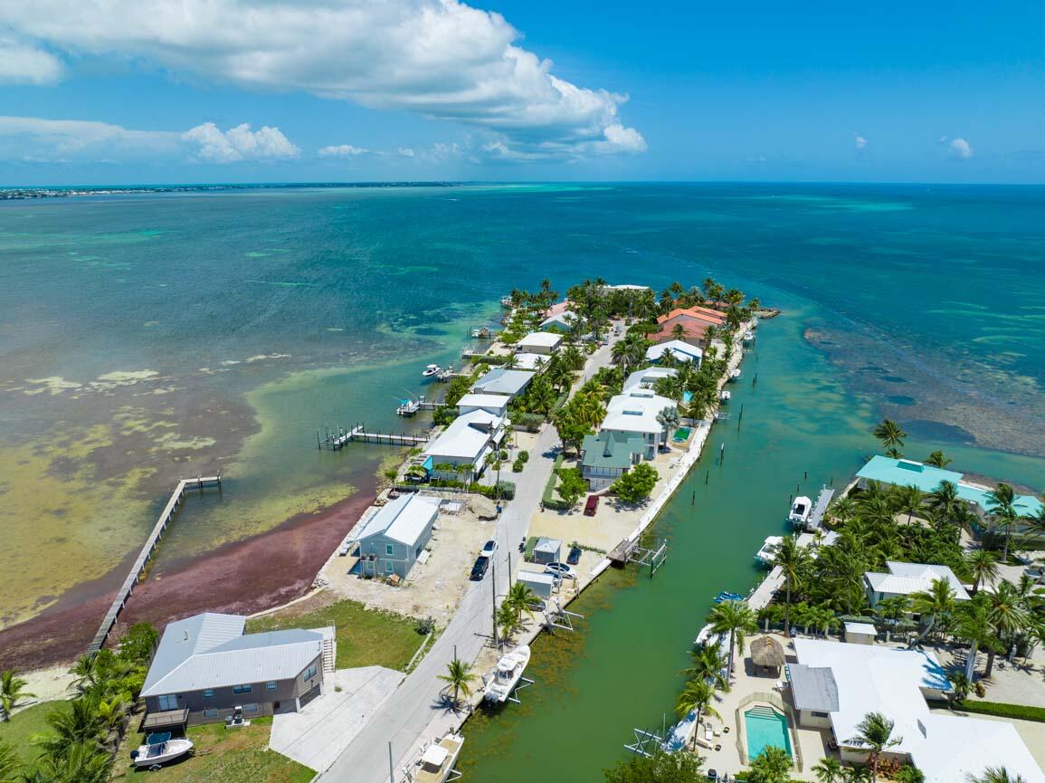 14 East Ocean Drive Marathon, FL 33050 - Photo 48 of 48 a view of a lake with a yard