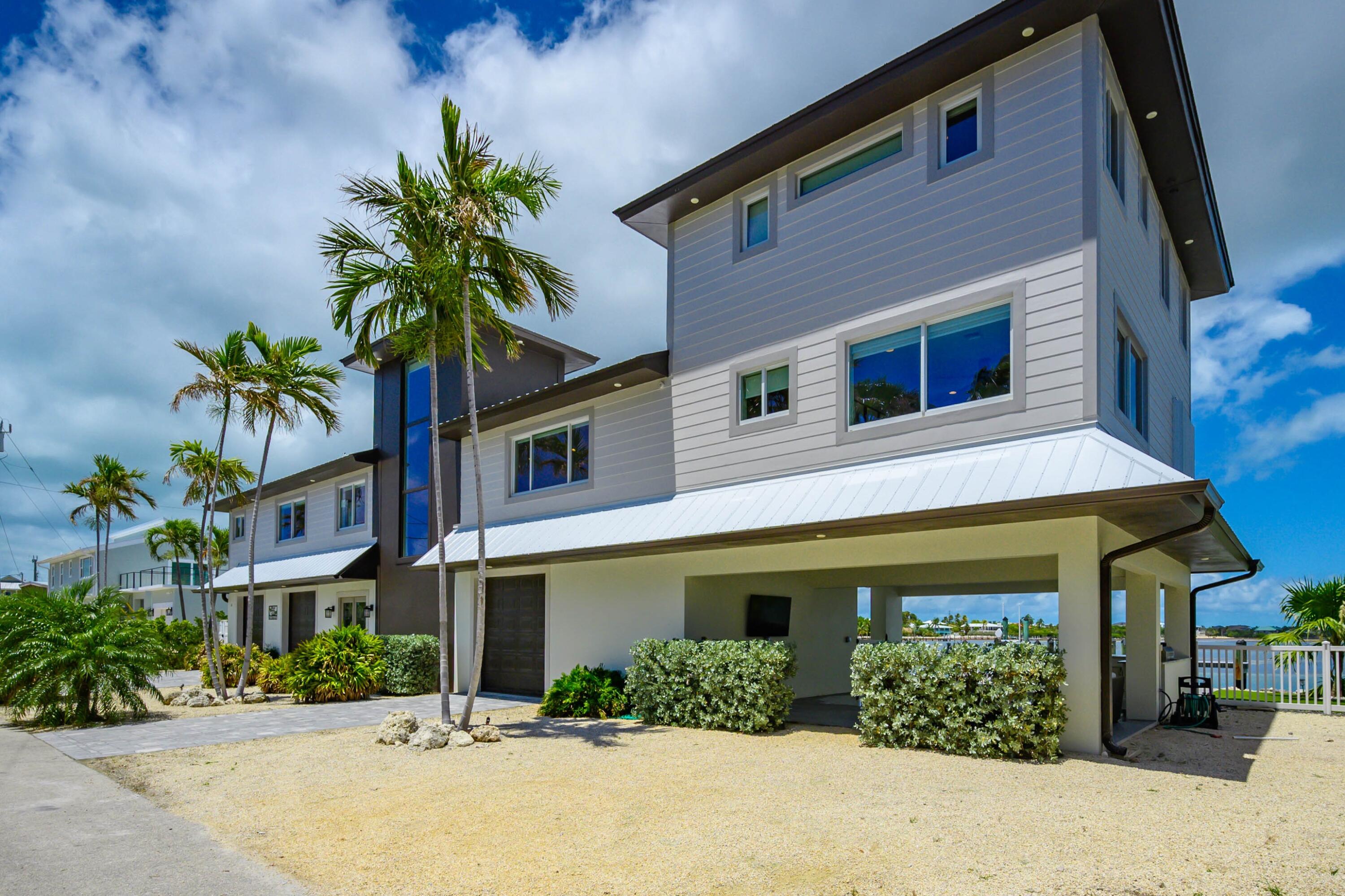 14 East Ocean Drive Marathon, FL 33050 - Photo 6 of 48 a front view of a house with a yard