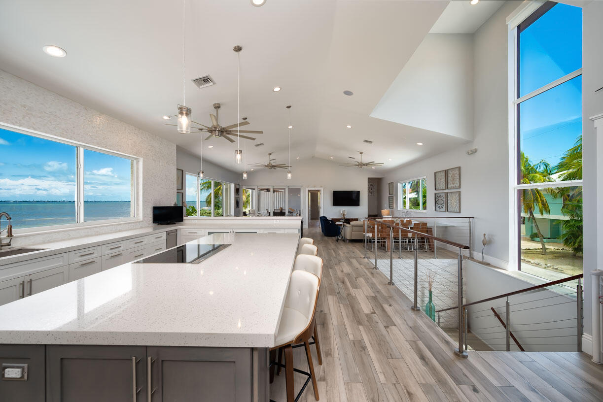 14 East Ocean Drive Marathon, FL 33050 - Photo 9 of 48 a view of a dining hall with furniture and a large window