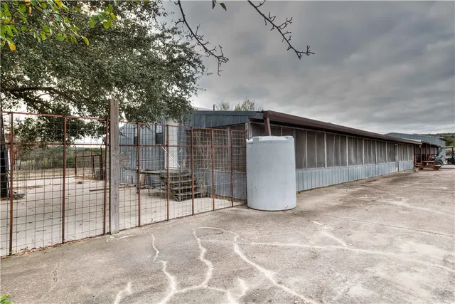a view of parking garage with cars