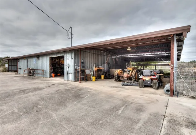 a view of a living room filled with furniture