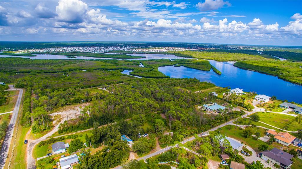 Deer Court Venice, FL 34293 - Photo 17 of 18 a view of a swimming pool with a yard