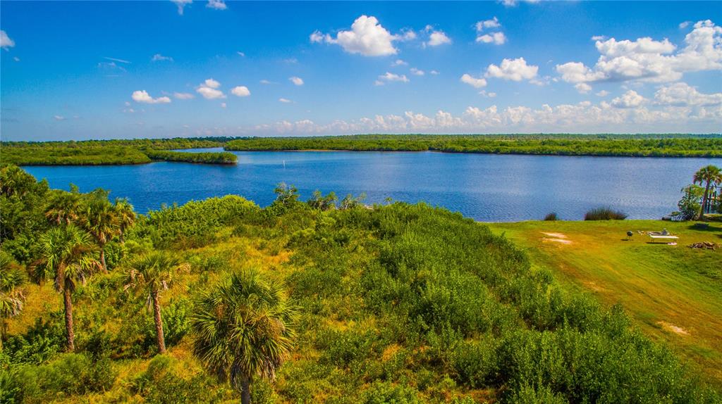 Deer Court Venice, FL 34293 - Photo 10 of 18 a view of a lake with a big yard