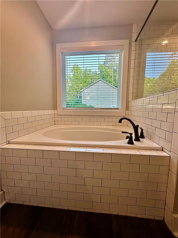 815 Poplar Street Monticello, GA 31064 - Photo 24 of 33 a bathroom with a sink and a bathtub