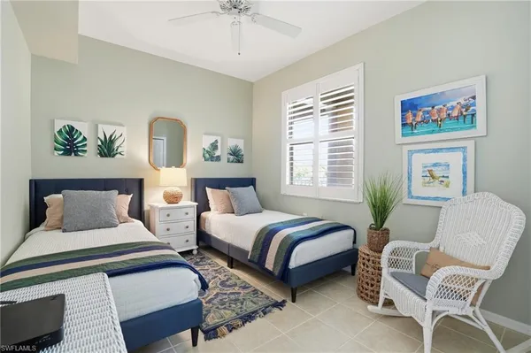 a bedroom with a bed and furniture