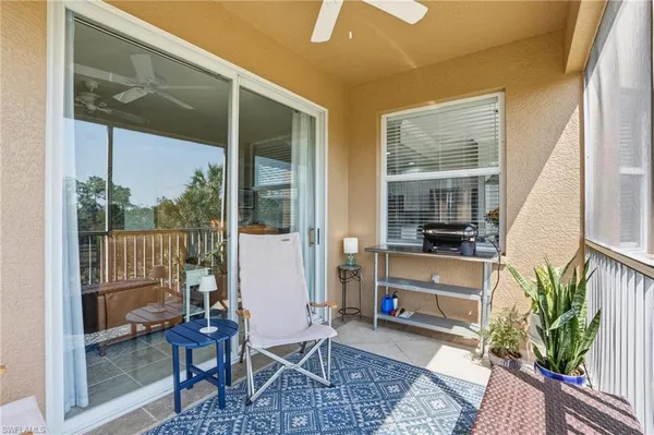 a view of a chair in a balcony