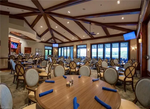 a living room with fireplace furniture and a fireplace