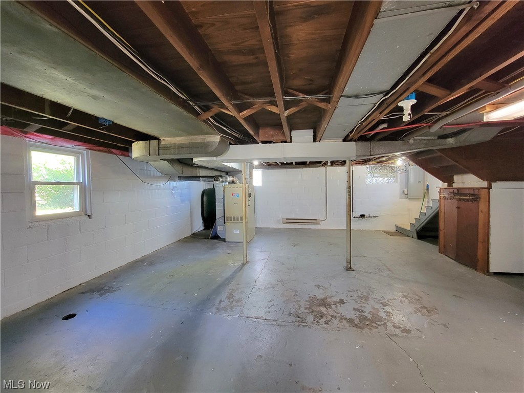 4506 Sandy Lake Road Ravenna, OH 44266 - Photo 27 of 32 Very spacious basement with canning room.