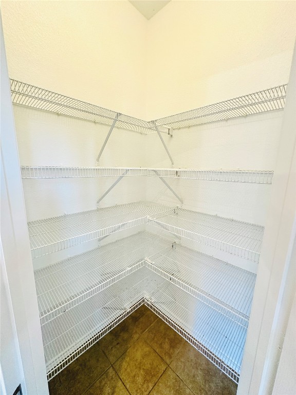 12112 Rancho Alto Road Austin, TX 78748 - Photo 23 of 34 a view of a room with empty racks