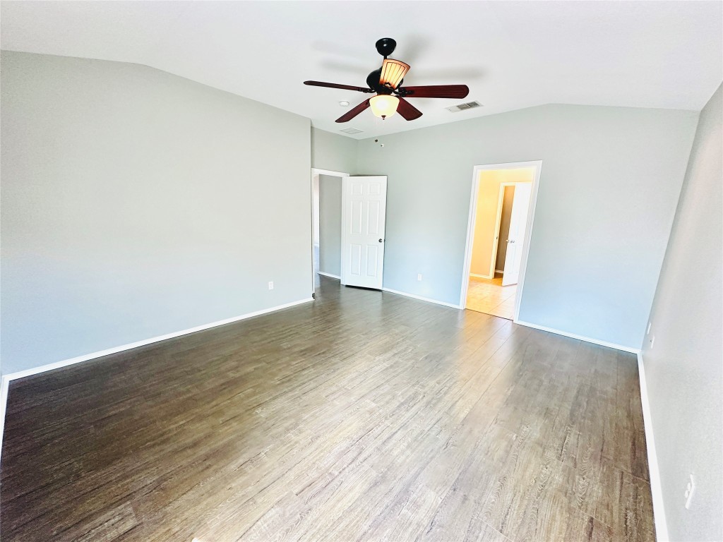12112 Rancho Alto Road Austin, TX 78748 - Photo 27 of 34 a view of empty room with wooden floor