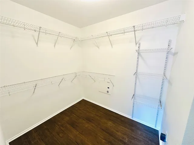 a view of a room with racks on the wall