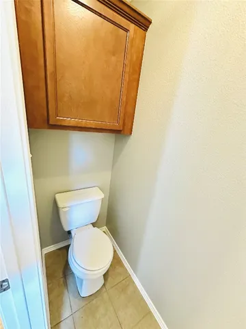 a bathroom with a toilet and a sink