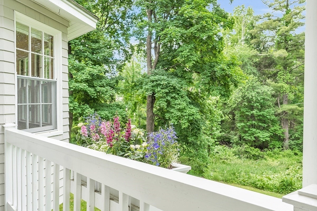 24 Sandy Pond Road Lincoln, MA 01773 - Photo 16 of 42 a view of a building from a window