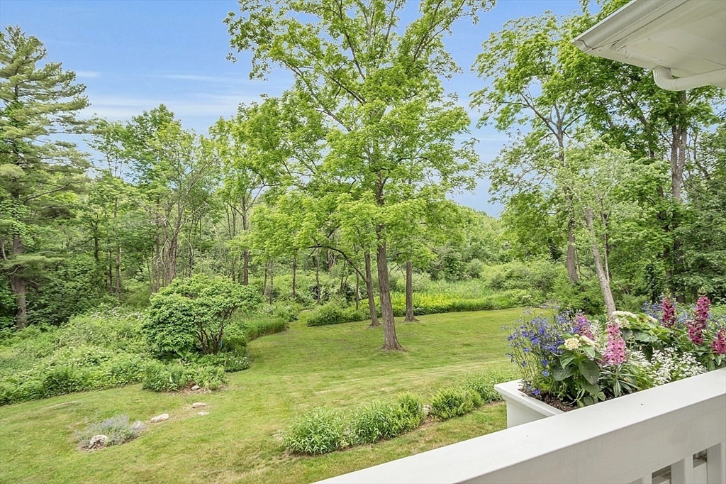 24 Sandy Pond Road Lincoln, MA 01773 - Photo 17 of 42 a view of a garden with a flower garden