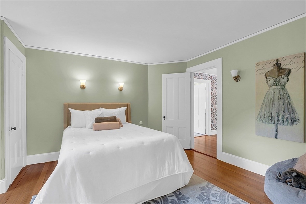 24 Sandy Pond Road Lincoln, MA 01773 - Photo 28 of 42 a bedroom with a bed and a window