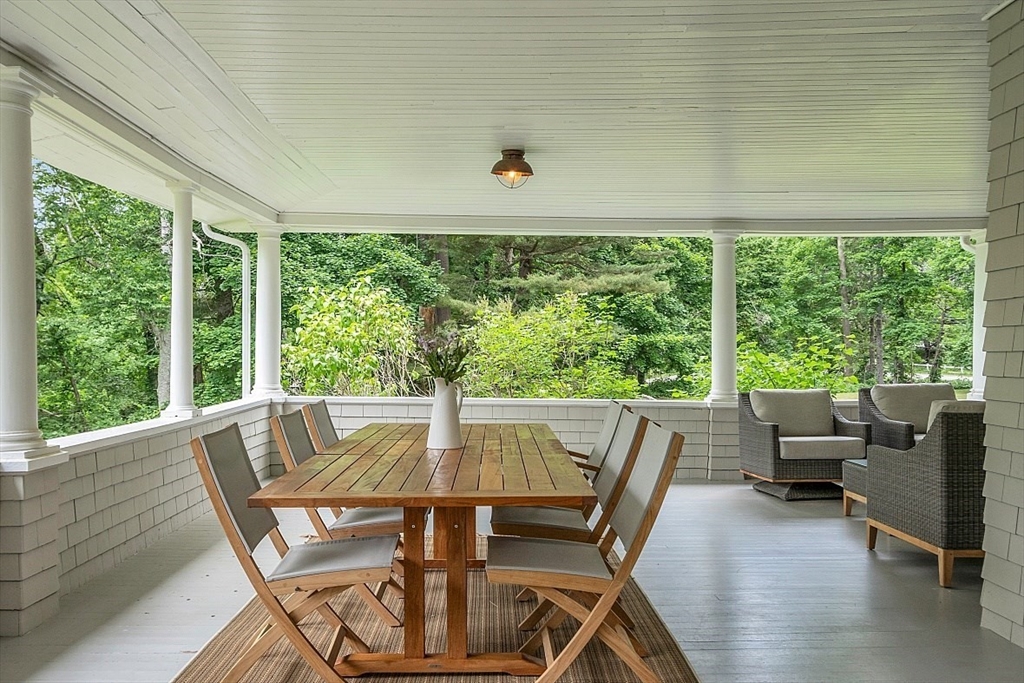 24 Sandy Pond Road Lincoln, MA 01773 - Photo 7 of 42 a view of a dining room with furniture window and outside view