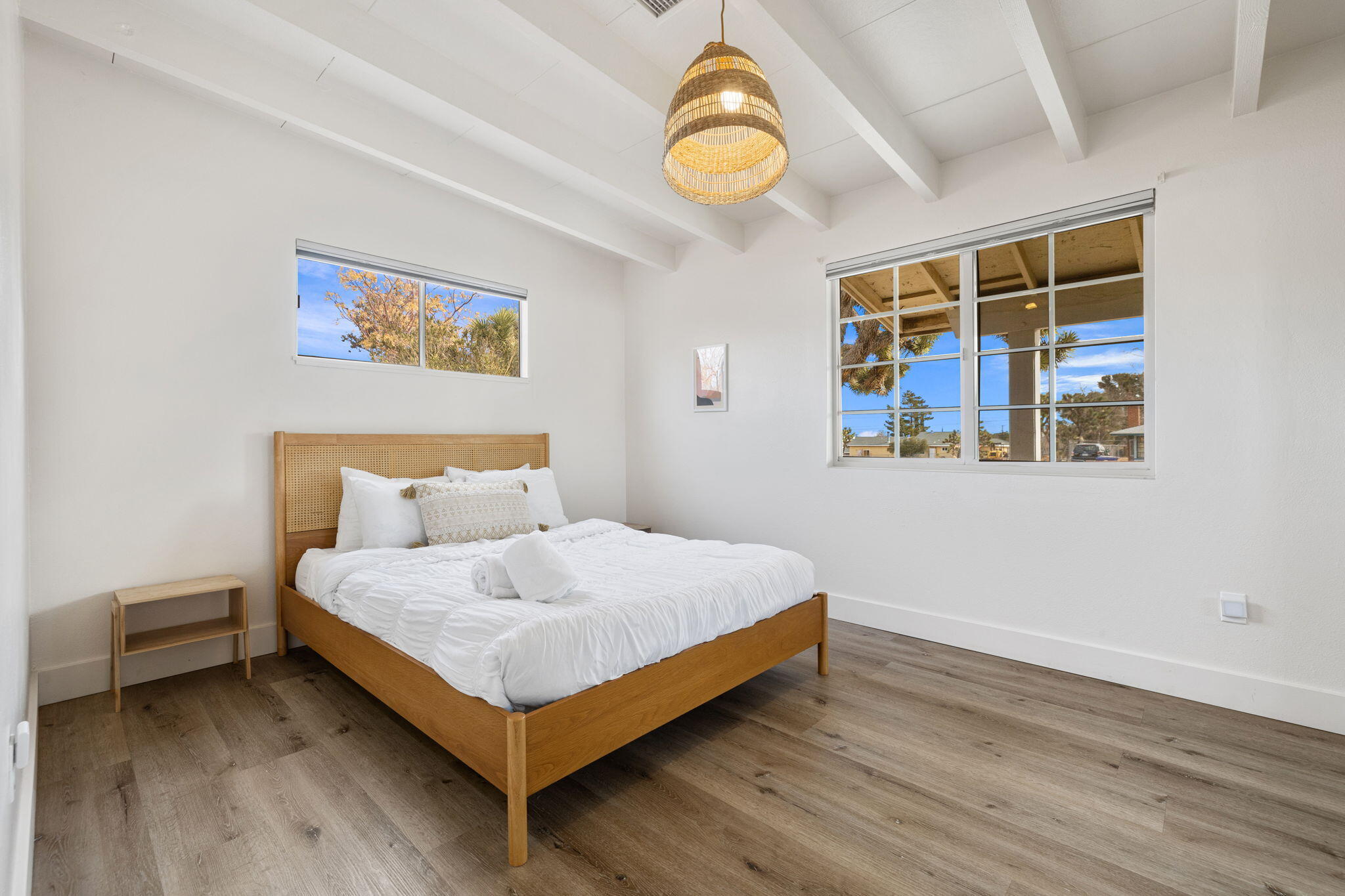 7552 Elk Trail Yucca Valley, CA 92284 - Photo 24 of 48 a bedroom with a bed and a window