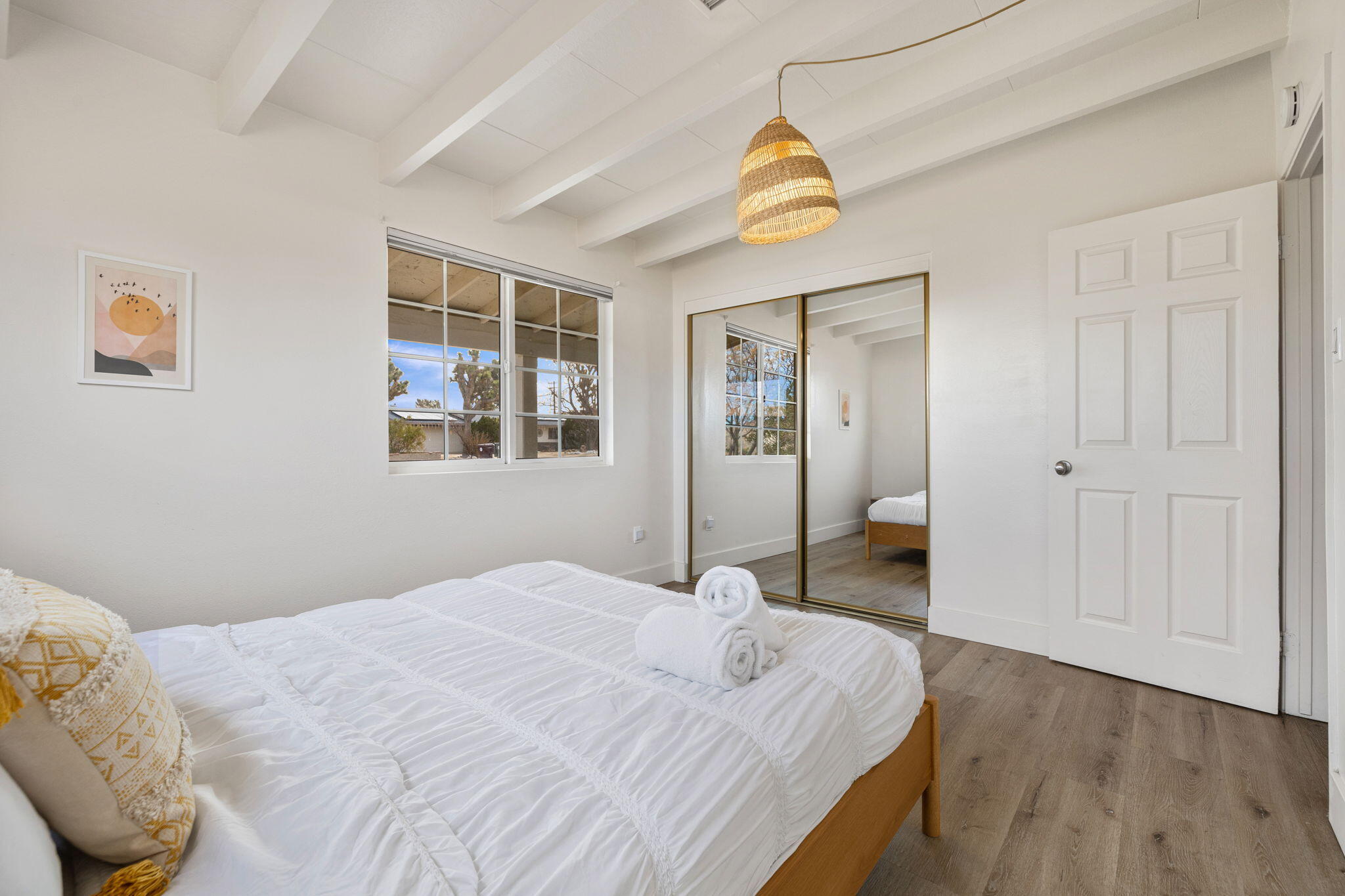 7552 Elk Trail Yucca Valley, CA 92284 - Photo 25 of 48 a bedroom with a bed and a window