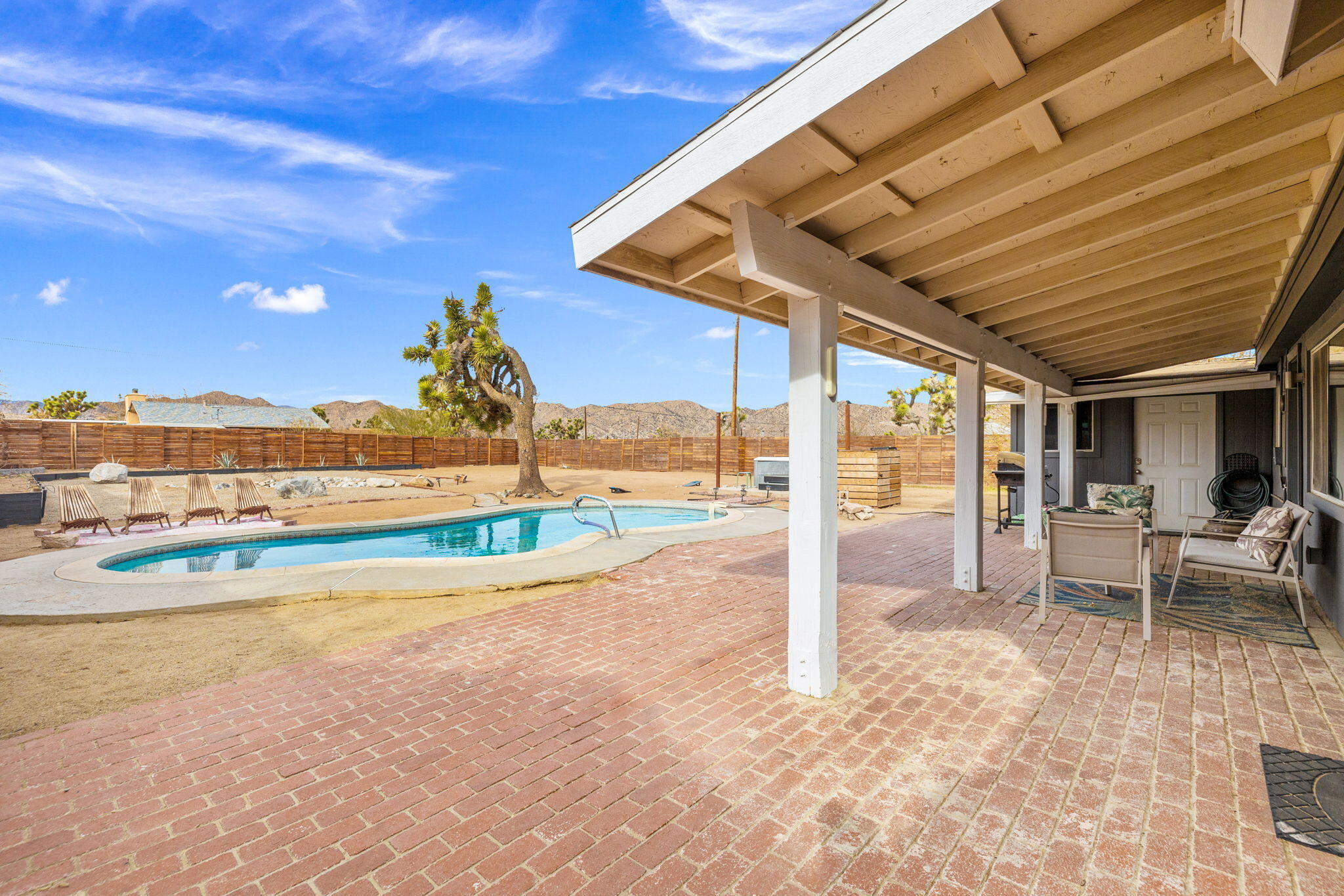 7552 Elk Trail Yucca Valley, CA 92284 - Photo 38 of 48 a view of swimming pool with seating area
