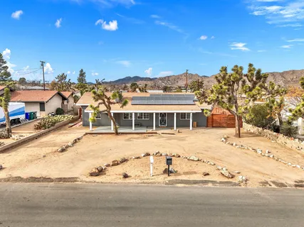 front view of a house with a ocean view