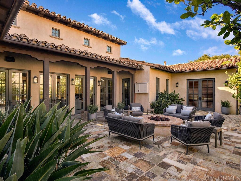 4272 Via Ravello Rancho Santa Fe, CA 92091 - Photo 11 of 38 a outdoor space with patio furniture and potted plants