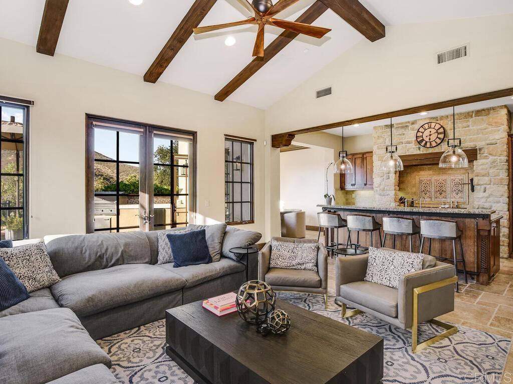 4272 Via Ravello Rancho Santa Fe, CA 92091 - Photo 15 of 38 a living room with furniture and a large window