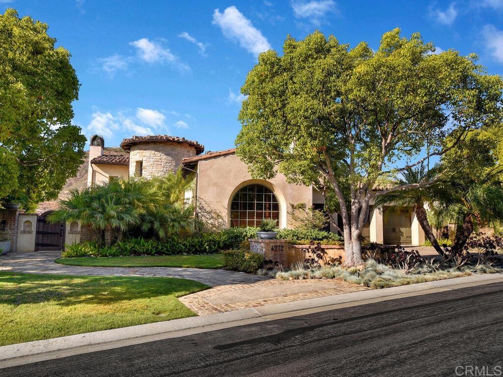 4272 Via Ravello Rancho Santa Fe, CA 92091 - Photo 2 of 38 a front view of a house with a yard