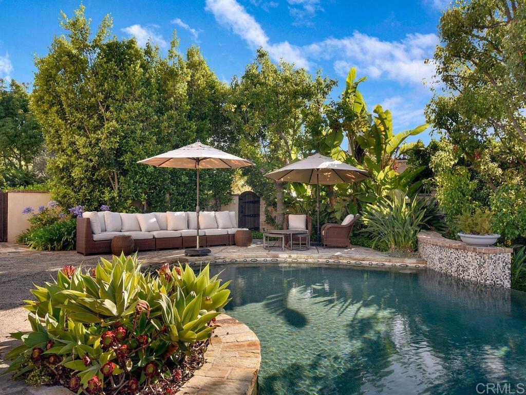 4272 Via Ravello Rancho Santa Fe, CA 92091 - Photo 29 of 38 a view of a swimming pool with a patio