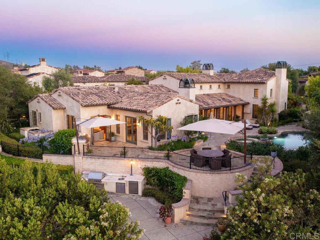 4272 Via Ravello Rancho Santa Fe, CA 92091 - Photo 32 of 38 an aerial view of a house with a garden and lake view