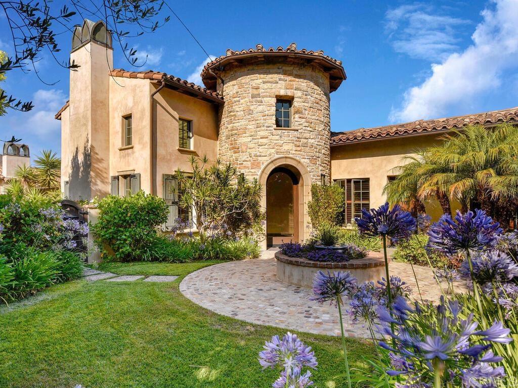 4272 Via Ravello Rancho Santa Fe, CA 92091 - Photo 4 of 38 a front view of a house with a yard