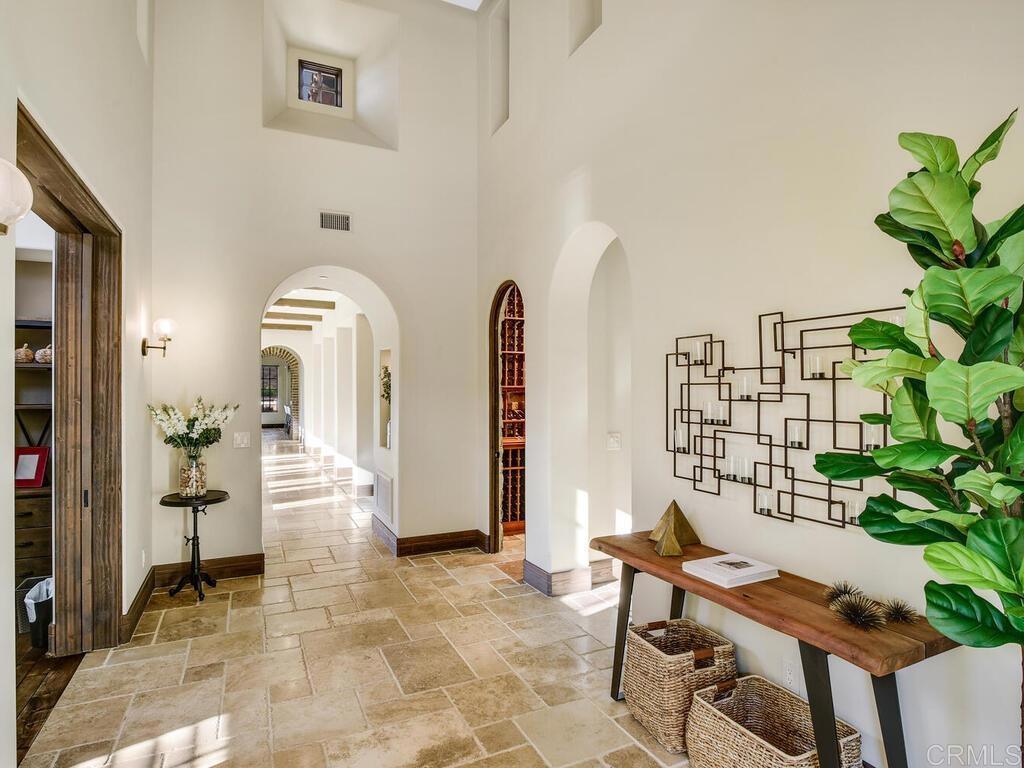 4272 Via Ravello Rancho Santa Fe, CA 92091 - Photo 5 of 38 a view of a livingroom with furniture and floor to ceiling window