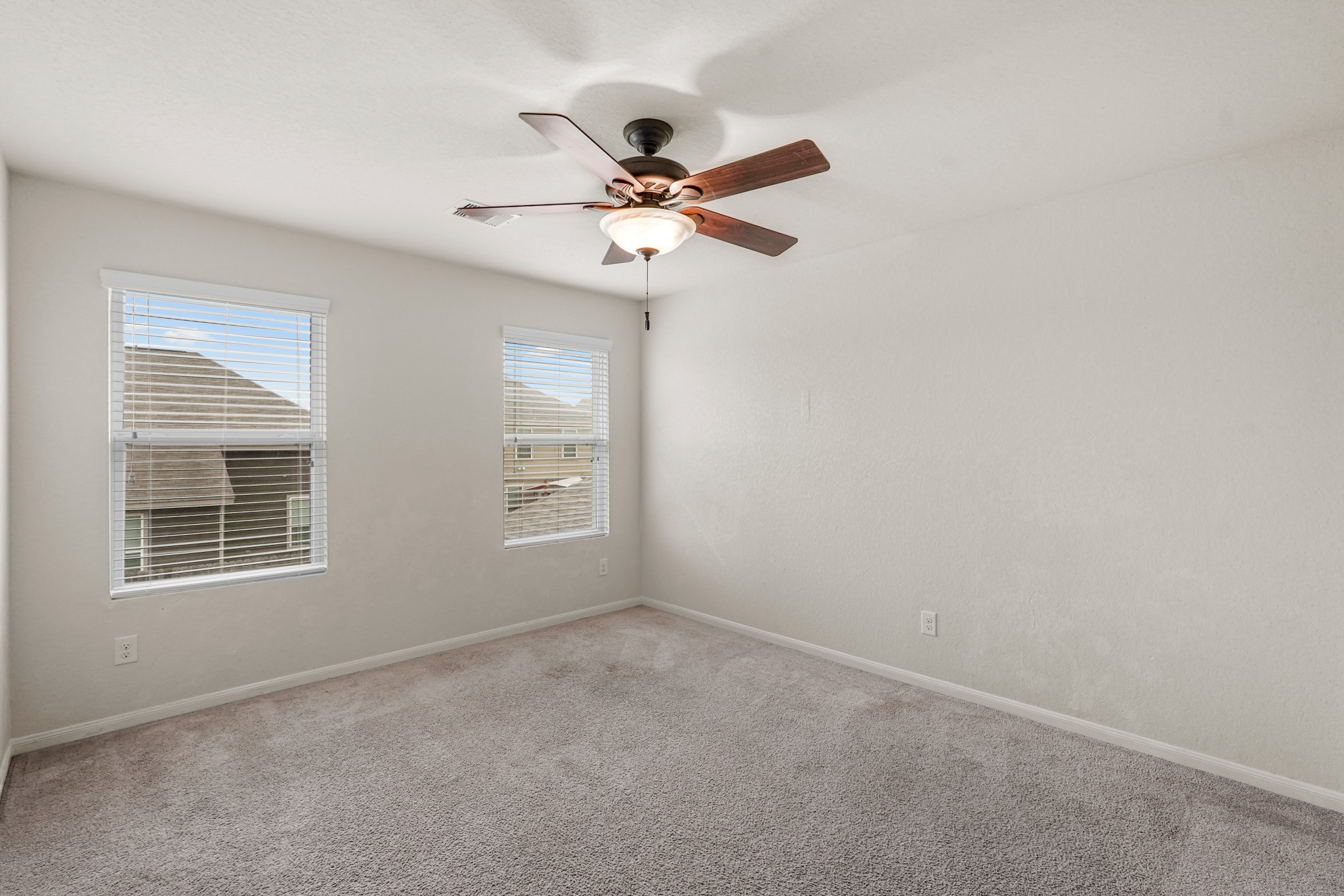 3215 Upland Spring Trace Katy, TX 77493 - Photo 12 of 24 a view of an empty room with a window