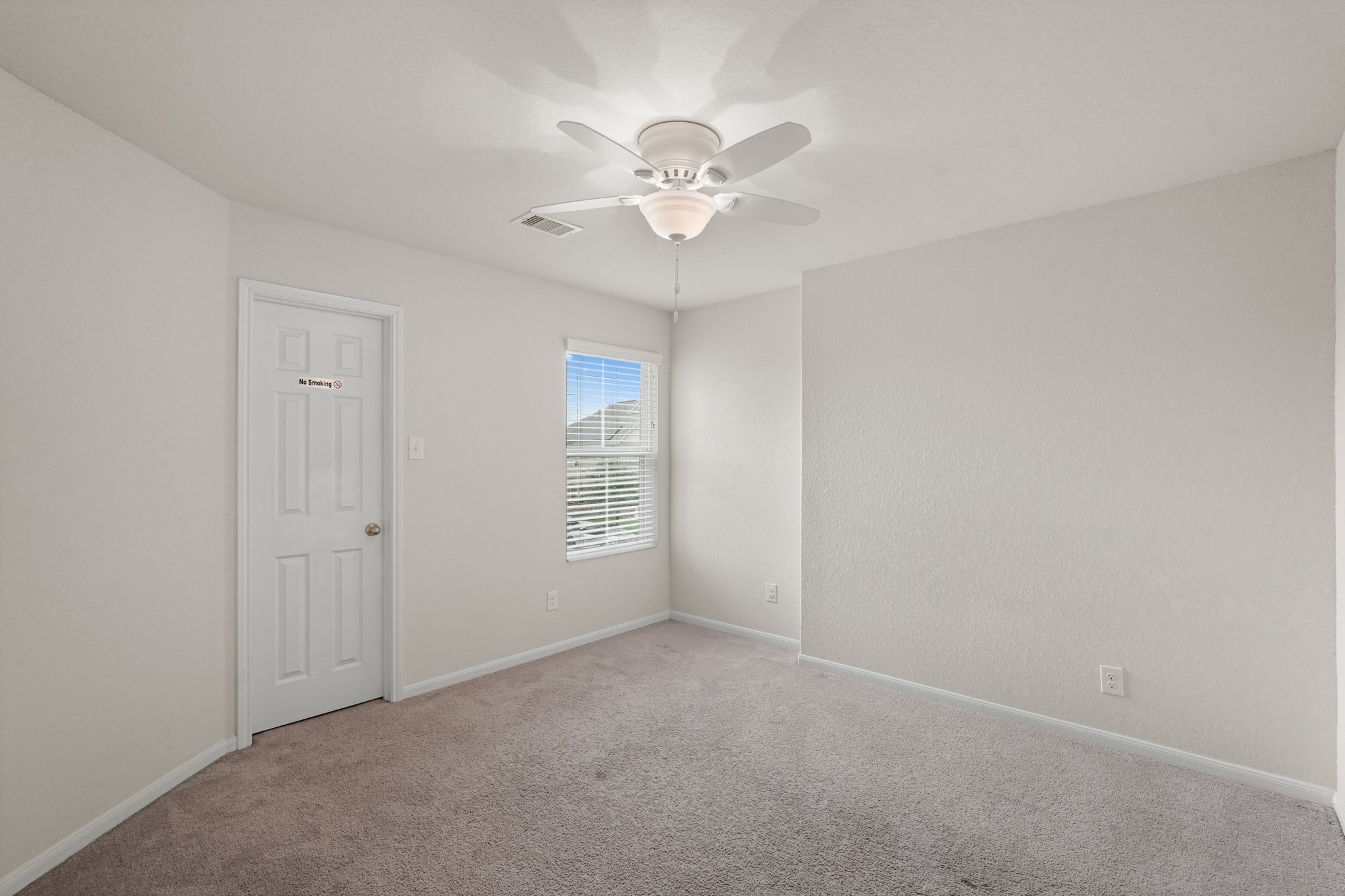 3215 Upland Spring Trace Katy, TX 77493 - Photo 13 of 24 a view of an empty room with a window