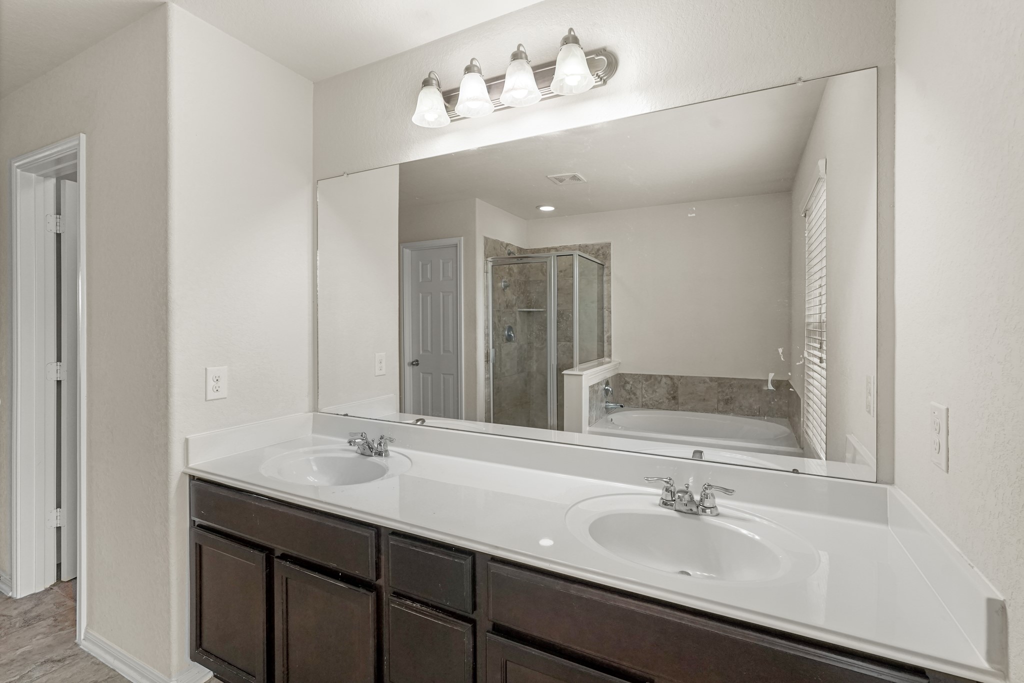 3215 Upland Spring Trace Katy, TX 77493 - Photo 17 of 24 a bathroom with a sink and a mirror