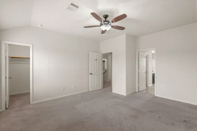 a view of an empty walk in closet