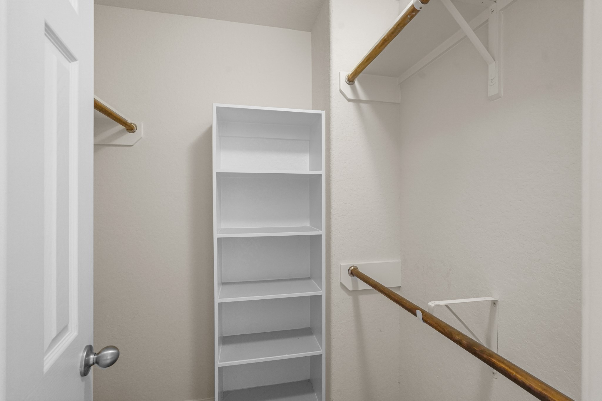 3215 Upland Spring Trace Katy, TX 77493 - Photo 21 of 24 a view of an empty walk in closet