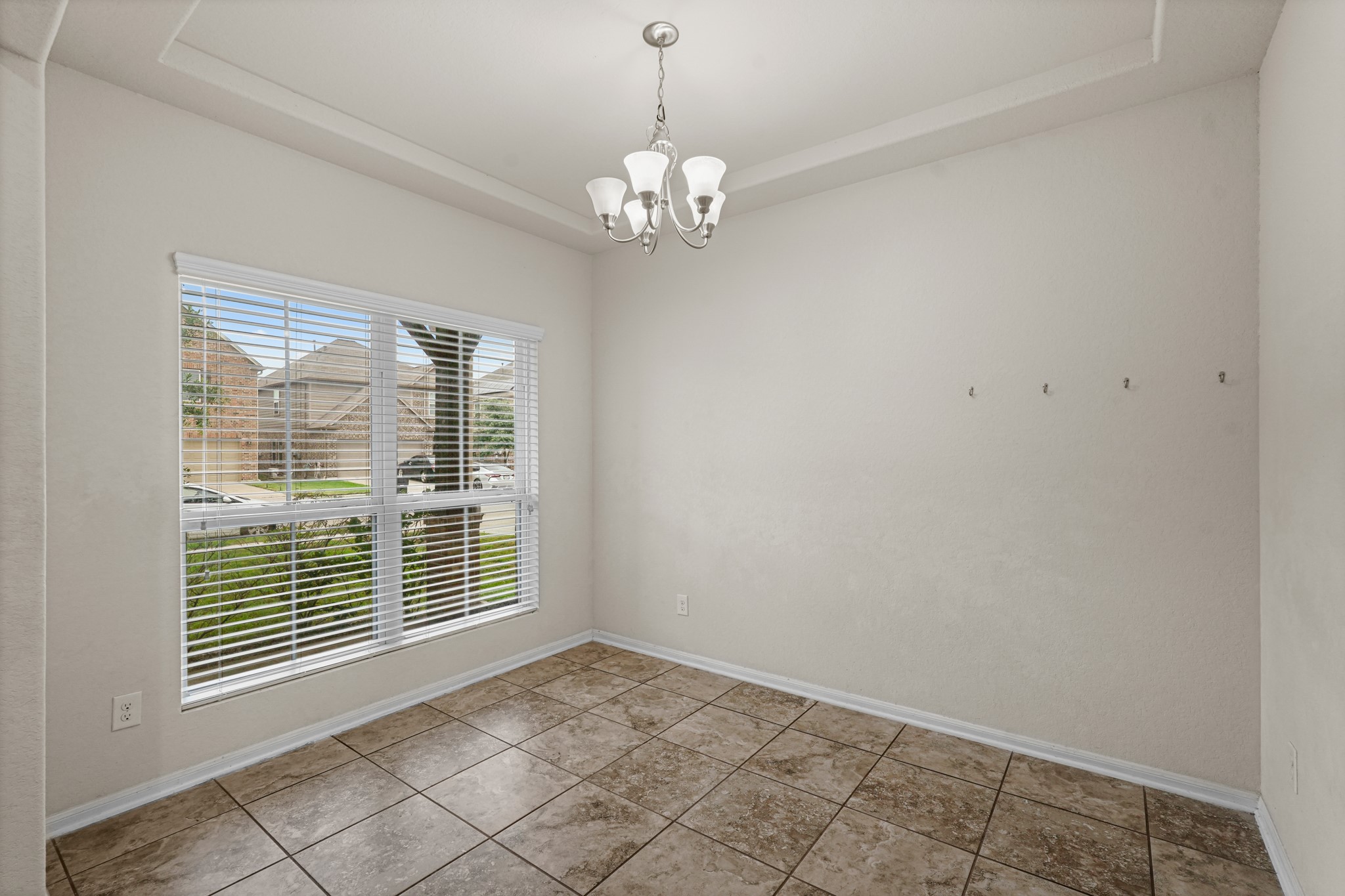 3215 Upland Spring Trace Katy, TX 77493 - Photo 5 of 24 a view of an empty room with a window