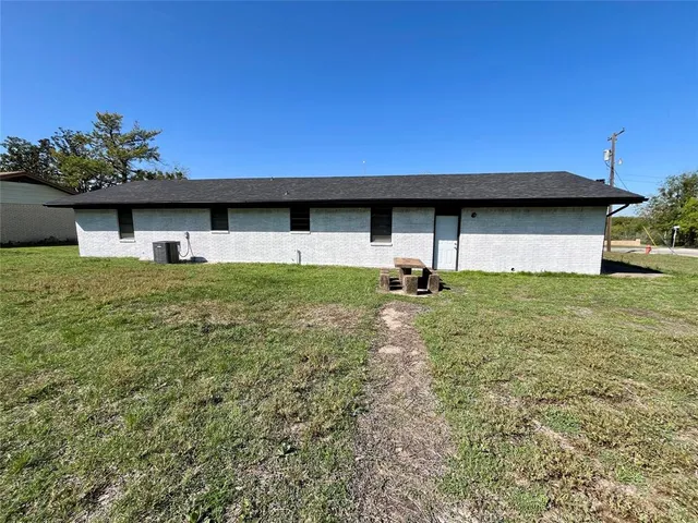 a house view with a garden space