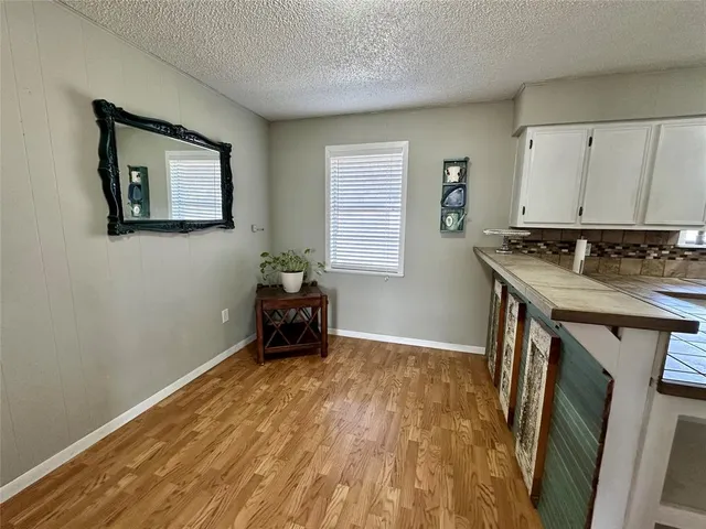 a room with furniture and a window