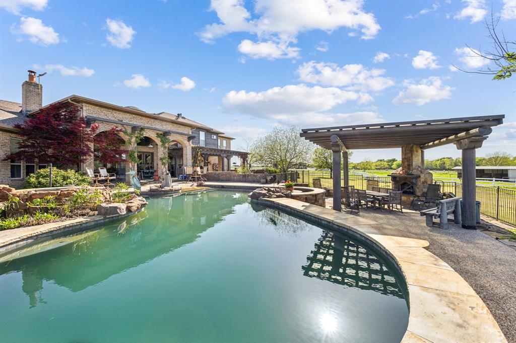 868 English Road Rockwall, TX 75032 - Photo 25 of 37 a view of swimming pool with outdoor seating