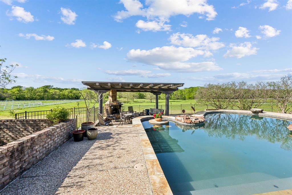 868 English Road Rockwall, TX 75032 - Photo 26 of 37 a view of swimming pool with a patio