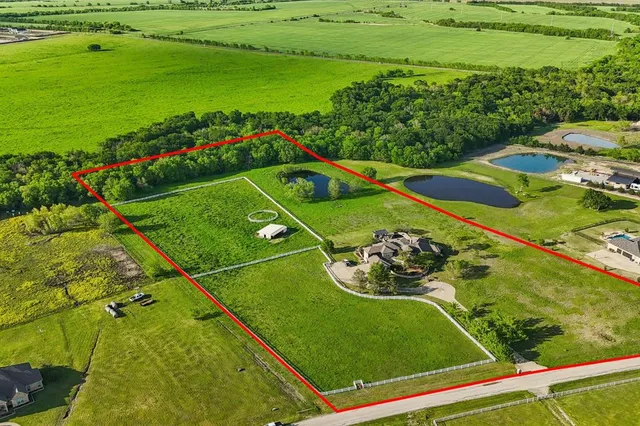 a view of a golf course with a garden