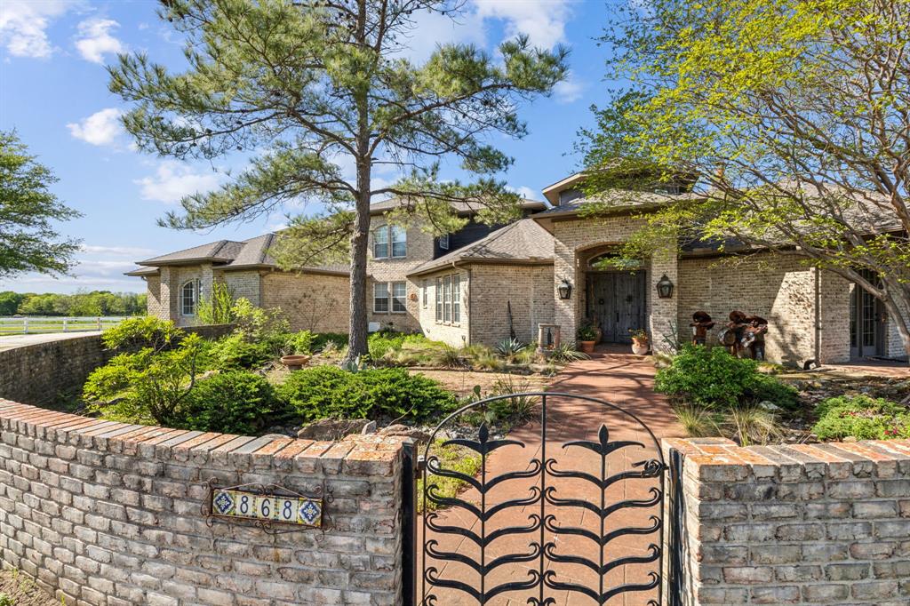 868 English Road Rockwall, TX 75032 - Photo 4 of 37 a view of a house with backyard and sitting area