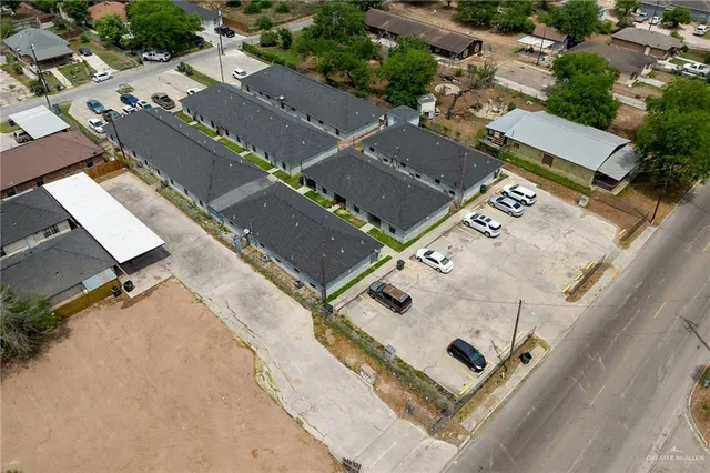 an aerial view of residential house with parking space