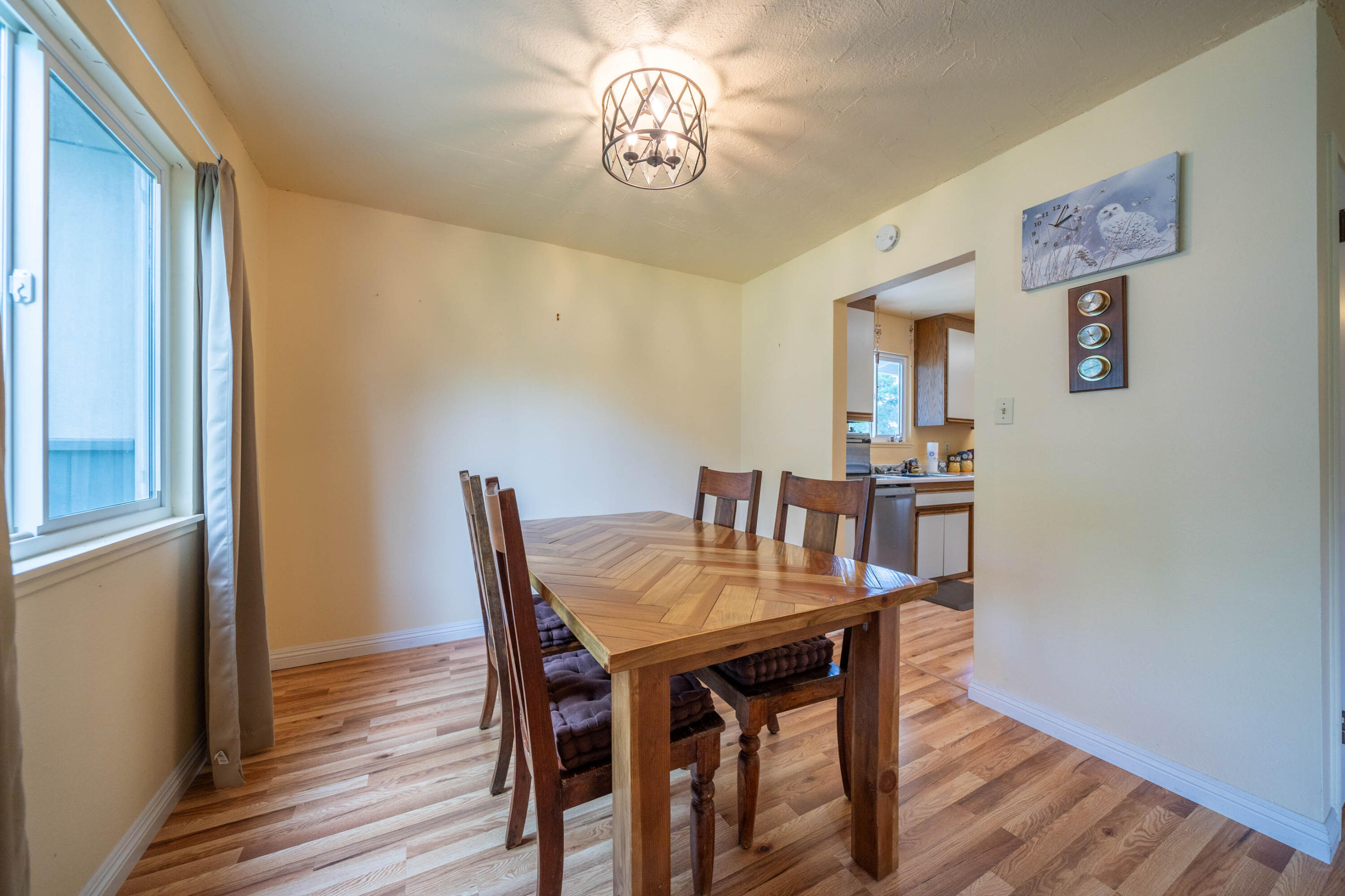 3055 Sharon Avenue Anderson, CA 96007 - Photo 13 of 52 a view of a dining room with furniture and wooden floor